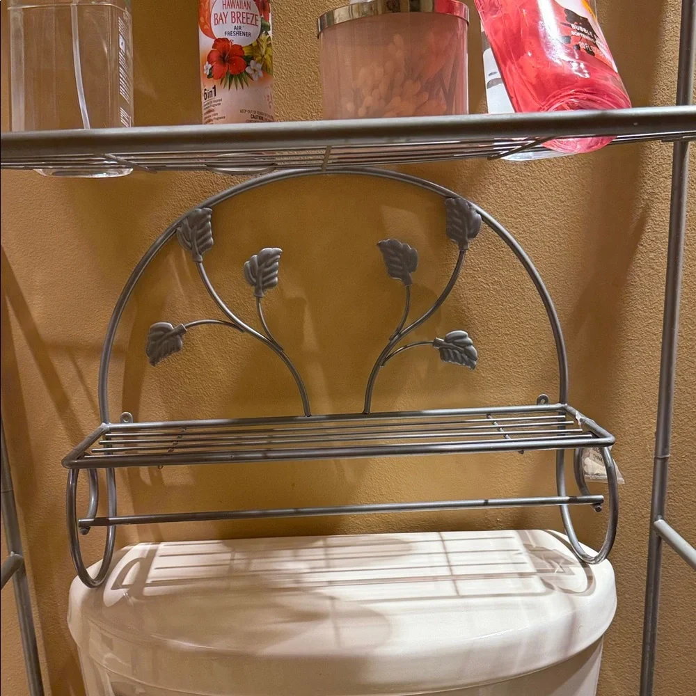 Elegant Gray Metal Wall Shelf with Leaf Design
